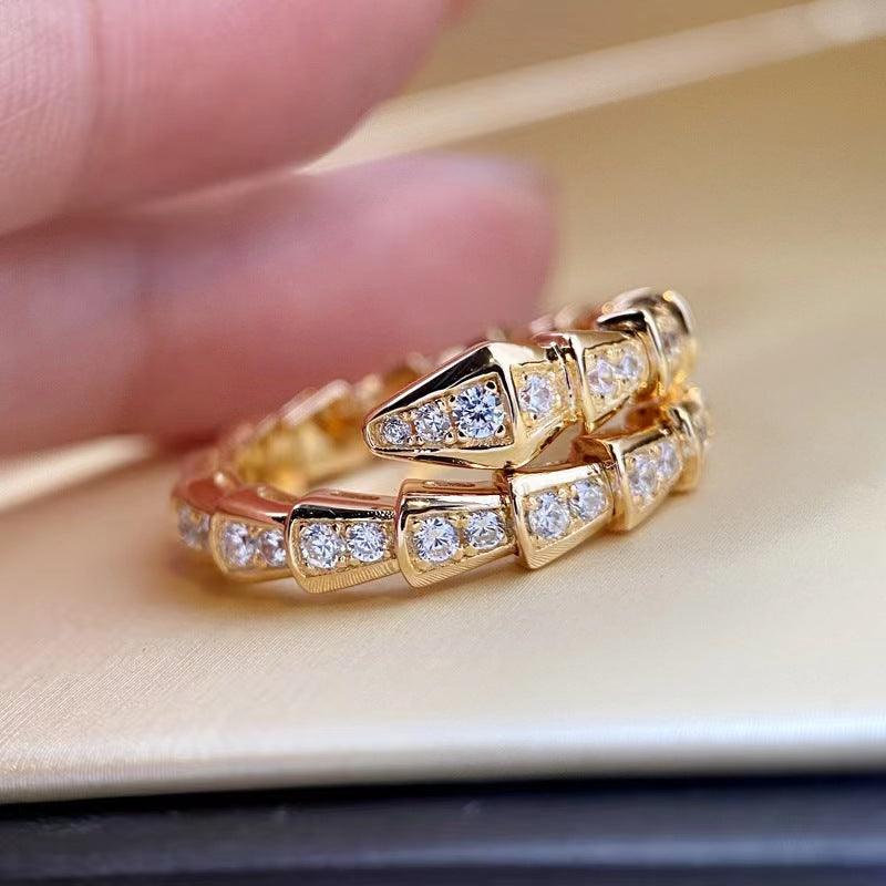 A3 Snake-bone shape Au750 cover by mini diamond ring