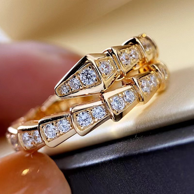 A3 Snake-bone shape Au750 cover by mini diamond ring