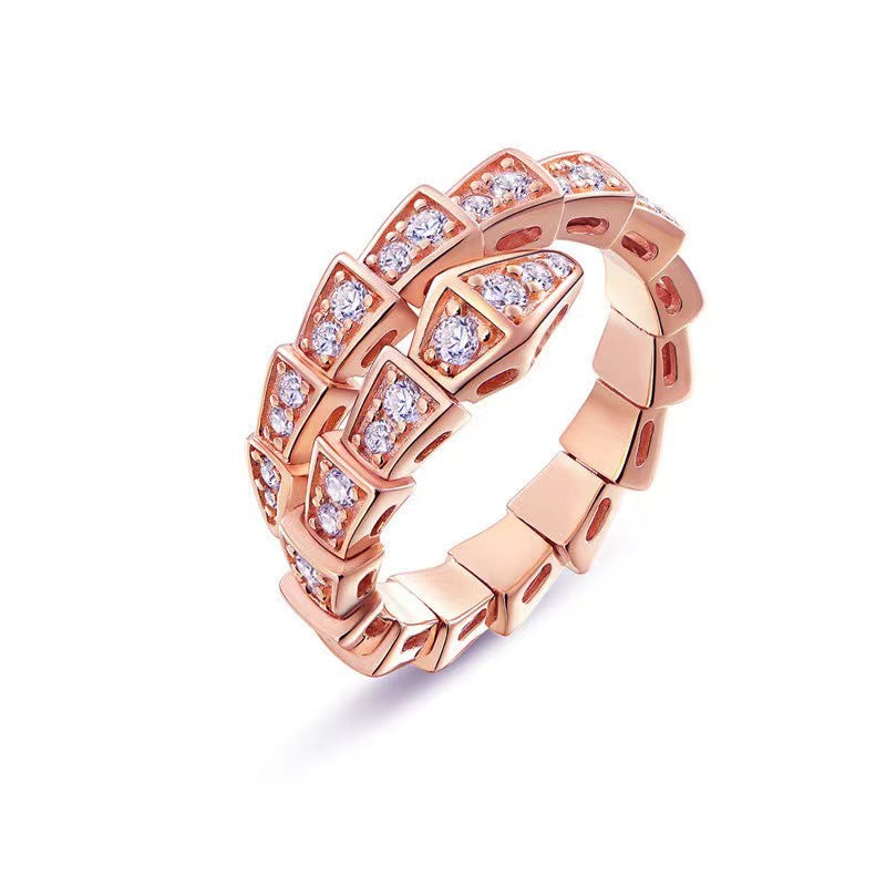 A3 Snake-bone shape Au750 cover by mini diamond ring