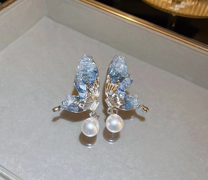 A32 Blue butterfly crystal with pearl earring