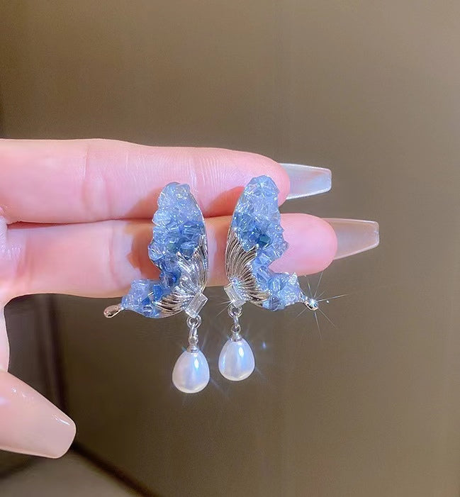 A32 Blue butterfly crystal with pearl earring