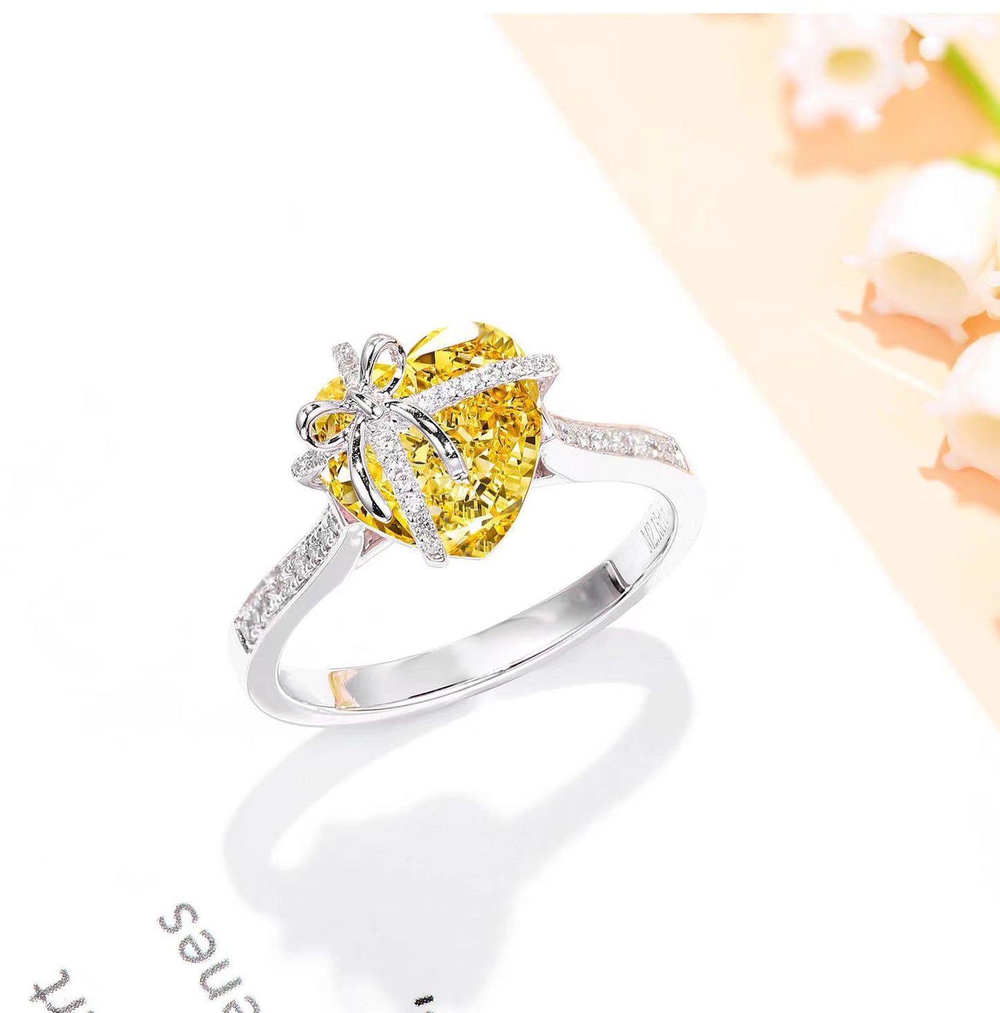 A9 Bow-heart yellow zircon ring